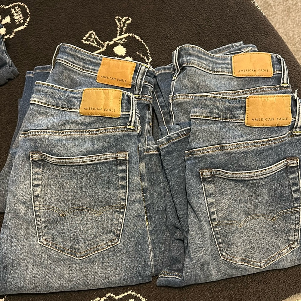 4 pair American Eagle Boot cut Jeans